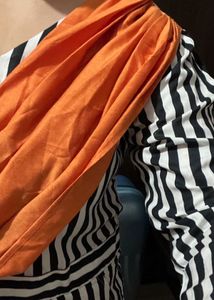 Bold Striped Jumpsuit with Statement Orange Detail