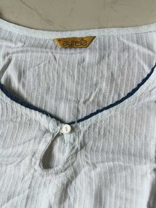 White kurta with beautiful floral work on it