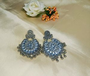 silver colour earrings