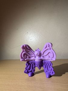 Purple Toy Figurine