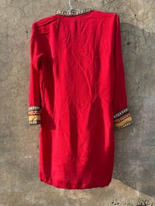 Red Embroidered Kurti With Salwar And Dupatta.