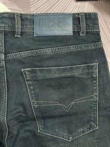 DIESEL FUEL FOR STYLE DENIM SLIGHTLY WASHED JEANS