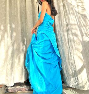 A Tube Party Wear Princess Gown With Heavy Flounce