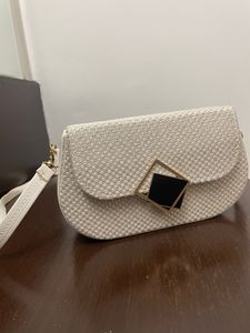 Beige sling bag