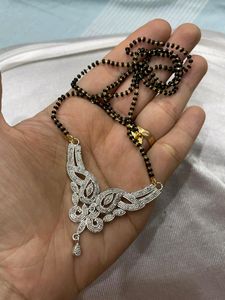 Ad Mangalsutra With Earrings
