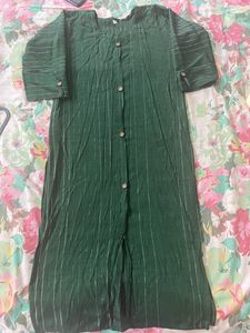 Dark Bottle Green Kurti On Hands Stitches Opened But Not Torn