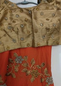 Elegant Orange Embroidered Saree