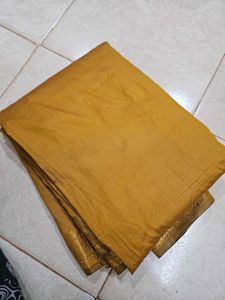Elegant Mustard Saree with Gold Border