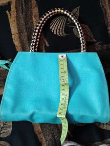 Teal Handbag with Embellishments