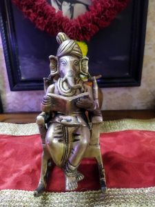 Ganesh Sitting On A Rocking Chair Idol