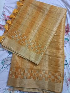 Elegant Mustard Saree with Gold Details