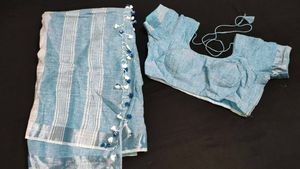 Sea Green Saree With Stitched Blouse.( 2 Items)