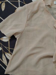 Elegant Beige Ruffle Top