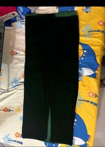 Elegant Dark Green  Saree with  Sleevless Blouse