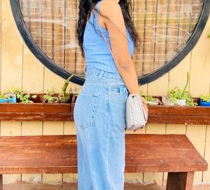 beautiful sky blue top. good condition worn only once. can style with black or blue jeans and with skirts . looks super classy.