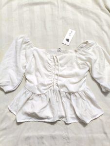 White Peplum Top
