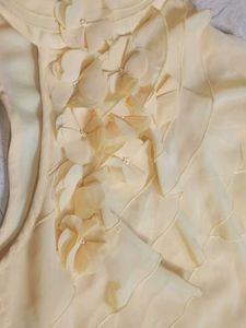 Yellow Sleeveless Ruffle Top