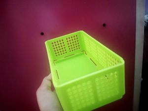 green basket bag with cover