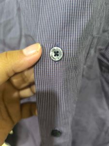 Purple Shirt With White Straps From Van Heusen.