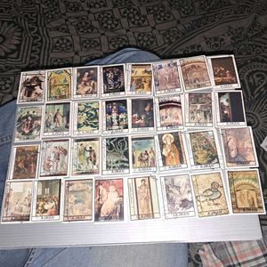 32 Vintage AJMAN painting stamps.