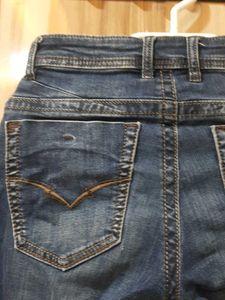 Ripped Blue Denim Jeans