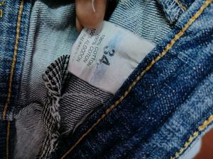 Distressed Denim Jeans