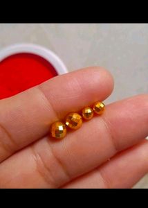 Two Pair Of Gold Earrings