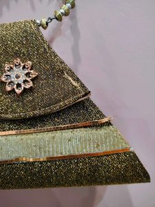 Unique Triangular Clutch