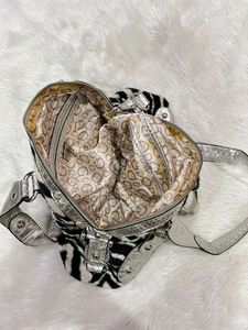 Guess animal zebra print furr Vintage Bag