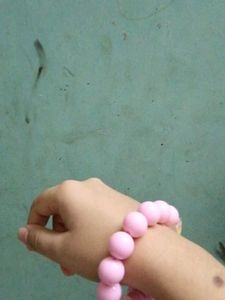 Pink Beaded Bracelet And Phone Charm