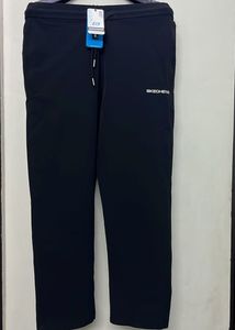 SKECHERS BLACK SOLID TRACK PANTS WITH 3 ZIP POCKET