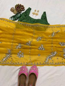 Elegant Yellow Embellished Saree