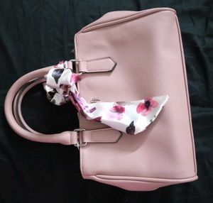 Chic Pink Handbag with Floral Scarf