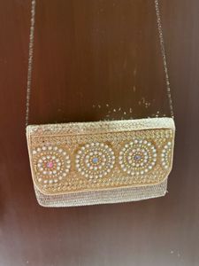 Golden Beaded Clutch