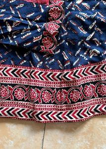 A light Festive Red Kurta Plazo Set