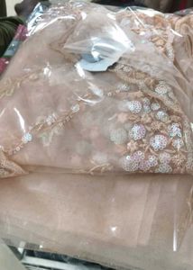 New fancy saree net pich colour with blouse