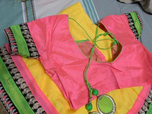 Bright Yellow Saree With Pink Blouse