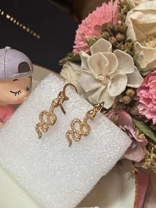 Gold Snake Earrings