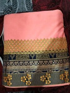 Elegant Peach Saree with Floral Border