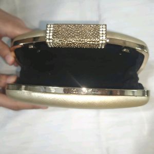 Golden Clutch Bag With Chain Sling Attachment