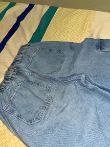 light blue colour shirt with a laces in back side