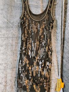A BLACK SEQUIN DRESS