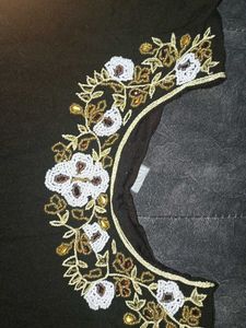 Embroidered gown with elegant pearl stone and embr