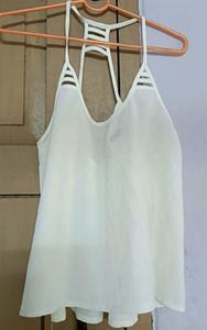 White sleeveless top