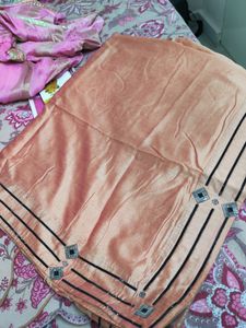 rust orange colour saree with black border