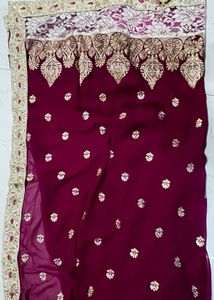 Elegant Maroon Embroidered Saree