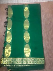 Elegant Green Saree with Gold Border