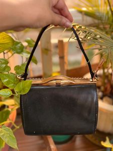 Black embellished sling bag
