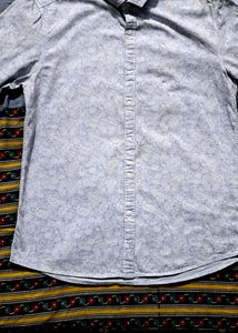 Branded printed leaf print shirt.