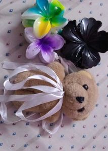 combo of 3 clutches and a teddy bear